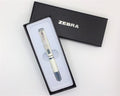 ZEBRA SL-F1 Golyóstoll – 0,24 mm, teleszkópos, metálfehér tolltest, kék
